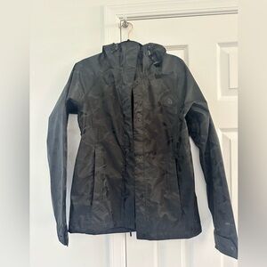 The North Face black camo rain jacket